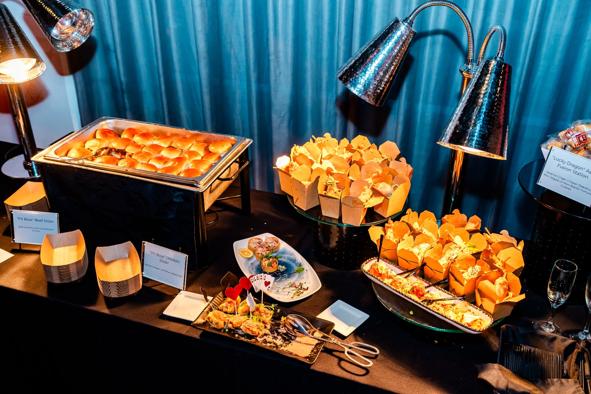 Chef-attended food stations set for a seated event at The MEZZ